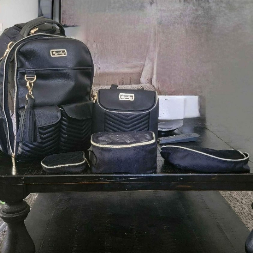 Itzy ritzy set / jet setter black diaper bag, packing cubes, & bottle bag